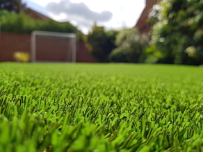 neatly installed fake grass on a playground