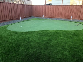 artificial grass neatly installed on a playground