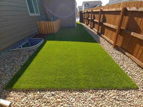 artificial grass neatly installed in a backyard