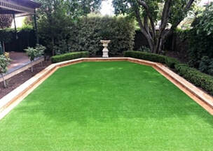 neatly installed artificial grass on a frontyard