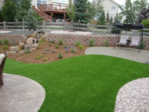 after photo of artificial grass installed in a lawn